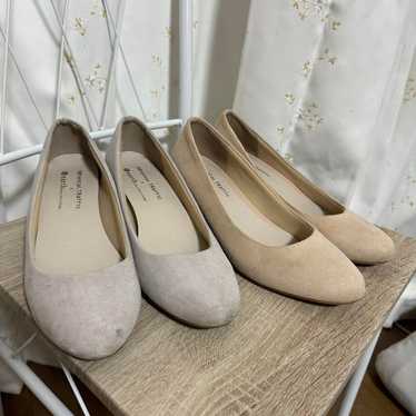 Two pairs of pumps