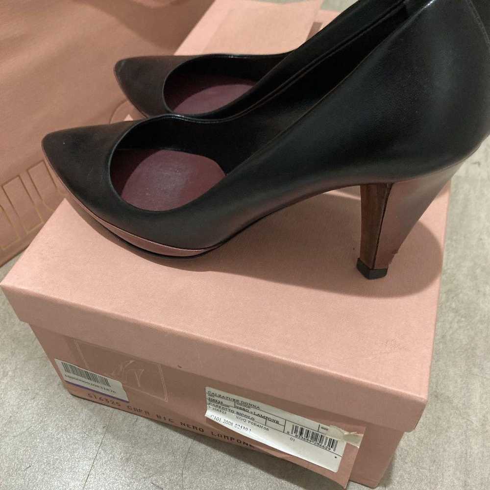 Miu Miu boxed leather pumps in black. - image 2