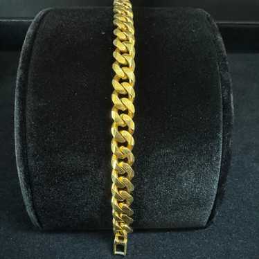 Womans Gold tone thick bracelet #498