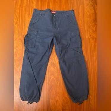 Supreme×Stone nylon cargopants Supreme Stone Island Painted Camo Nylon Cargo Pant (FW20) - $348