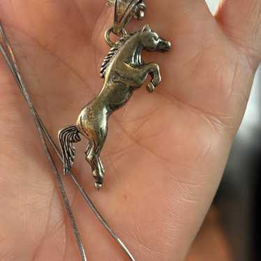 Sterling silver bucking horse necklace