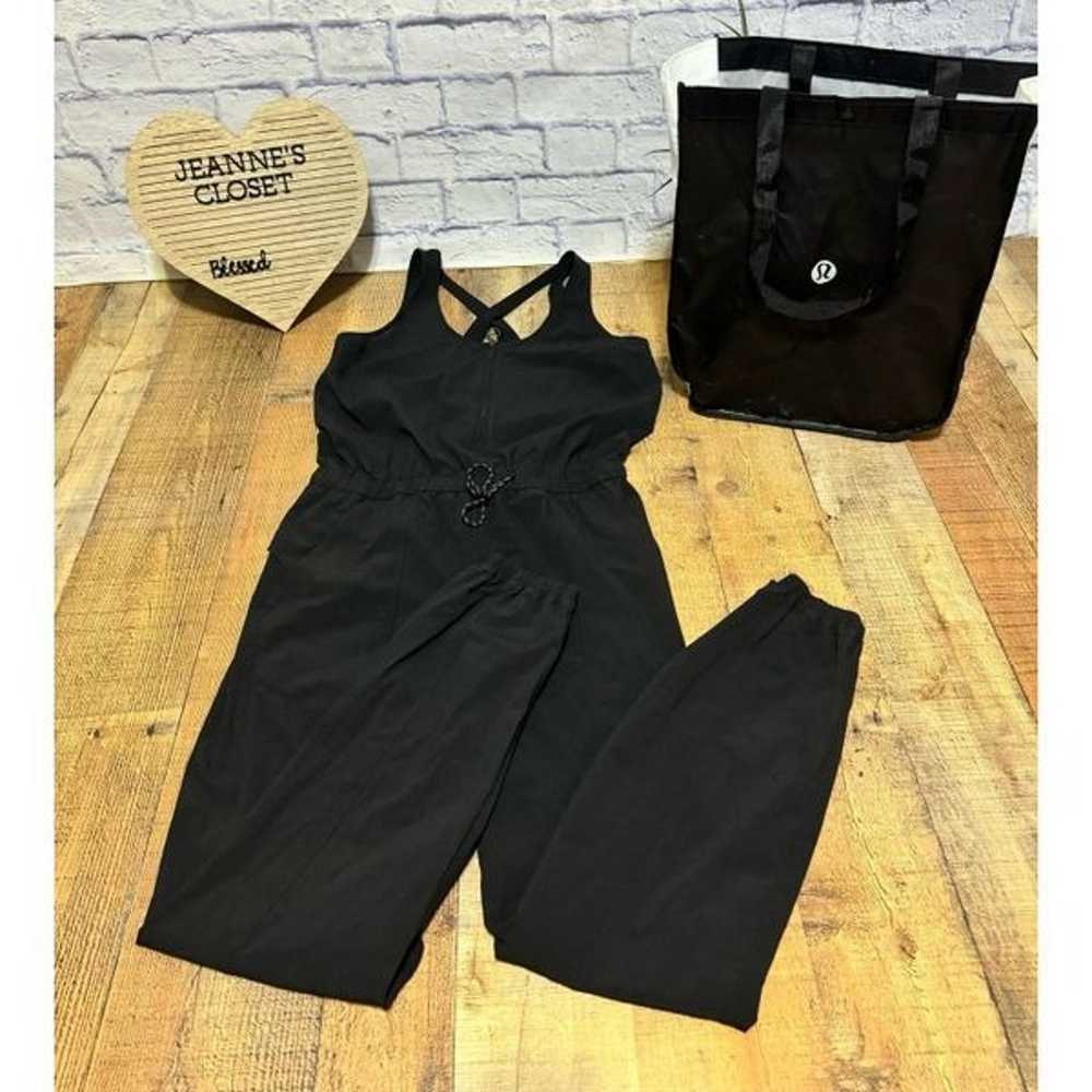 Lululemon Women's Shift In Time Jumpsuit Sleevele… - image 1