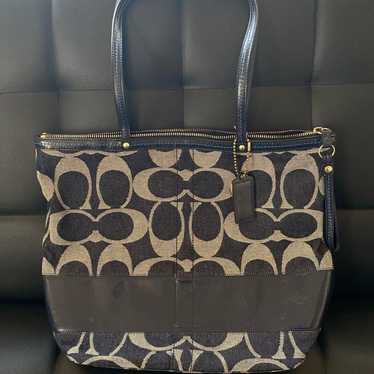 Brand new, unused COACH handbag.