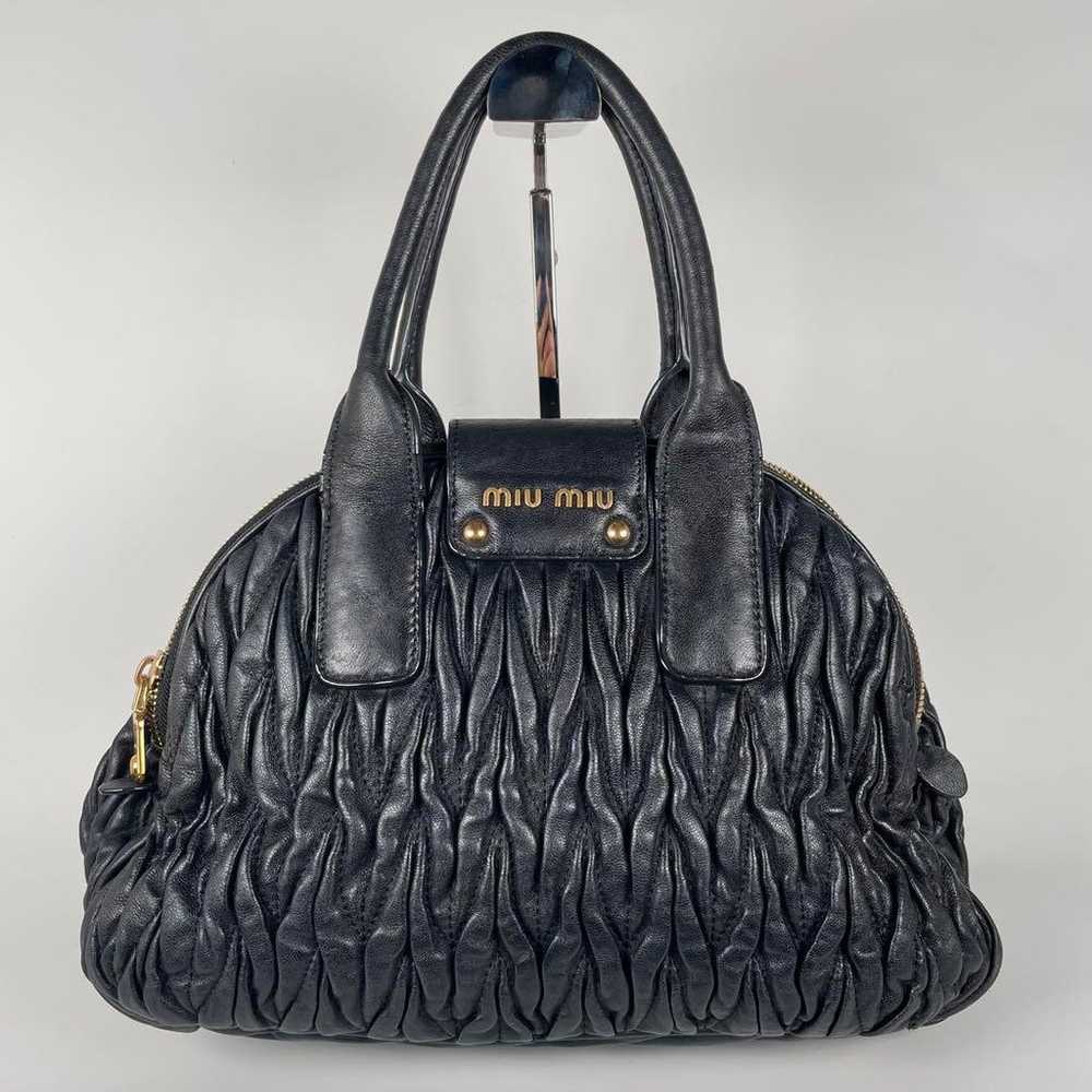 Miu Miu Matelassé Handbag - Black × Gold - Leather - image 1