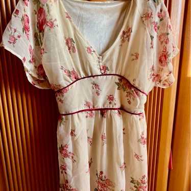 Floral cream-colored flare sleeve dress - image 1