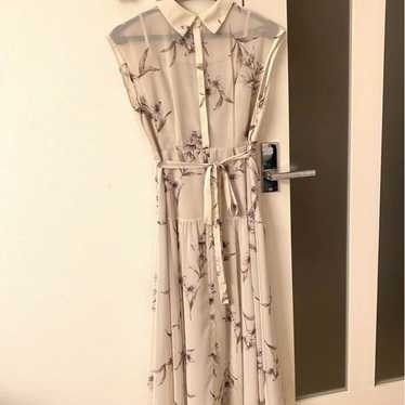 Noera, flower-patterned sleeveless shirt dress. - image 1