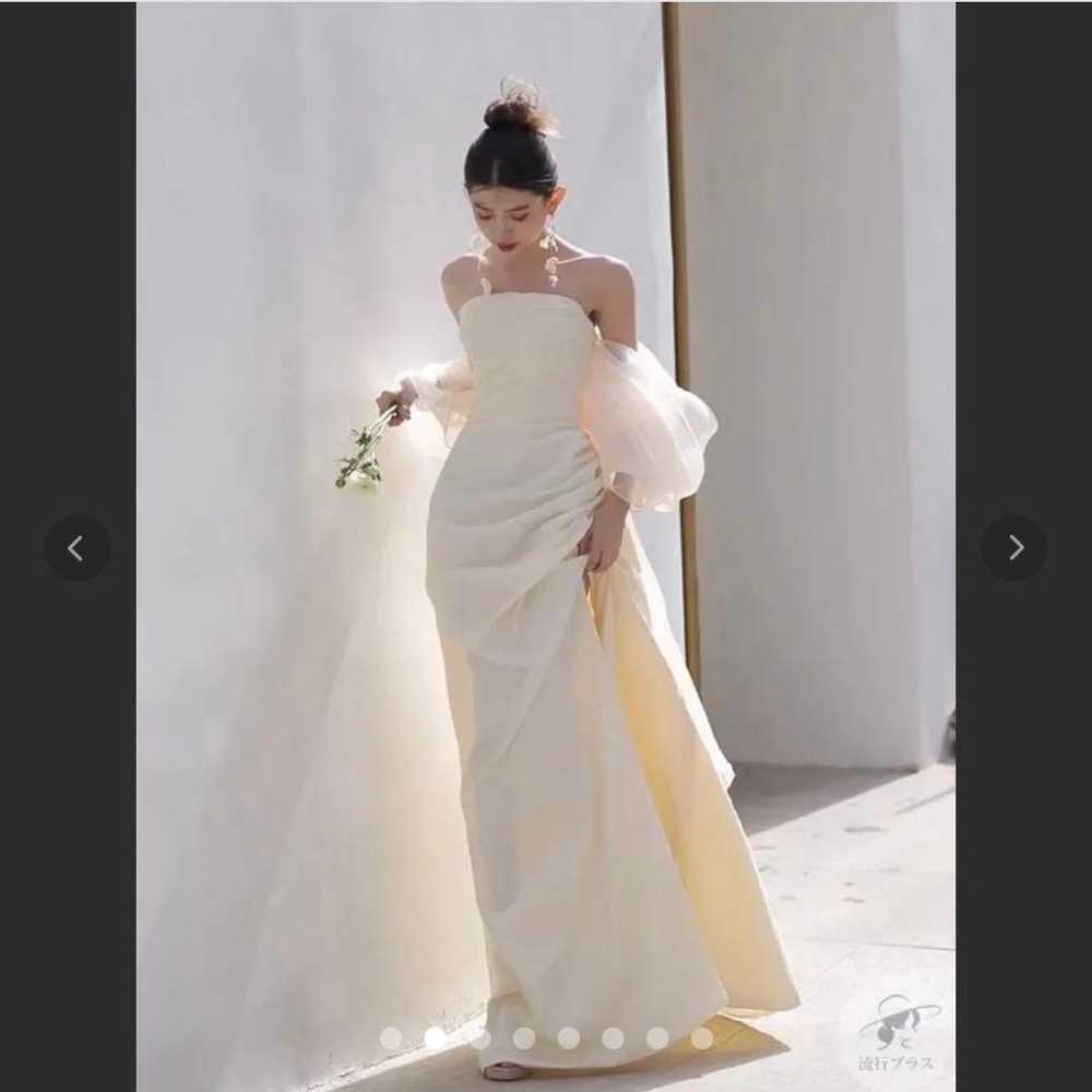 Cream-colored wedding dress, strapless. - image 2