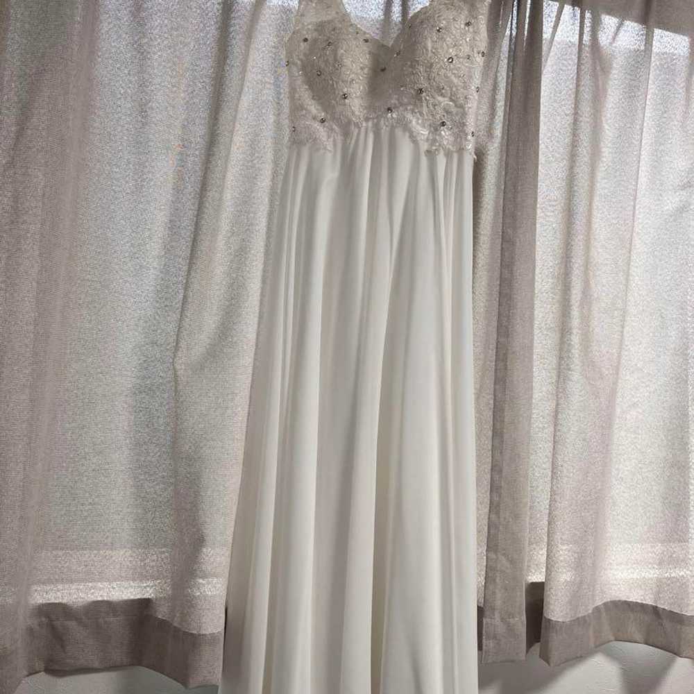 White bead-embroidered wedding dress - image 1