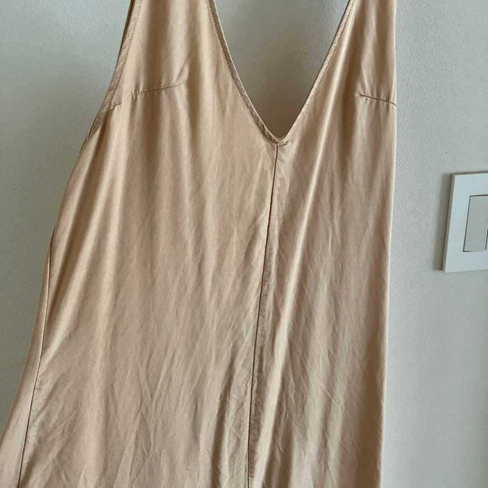 Long one-piece dress in beige. - image 2