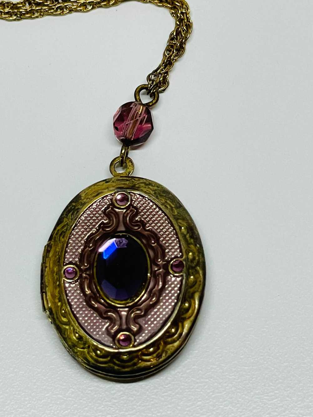 Avon Gold Locket with Purple Rhinestones - image 2