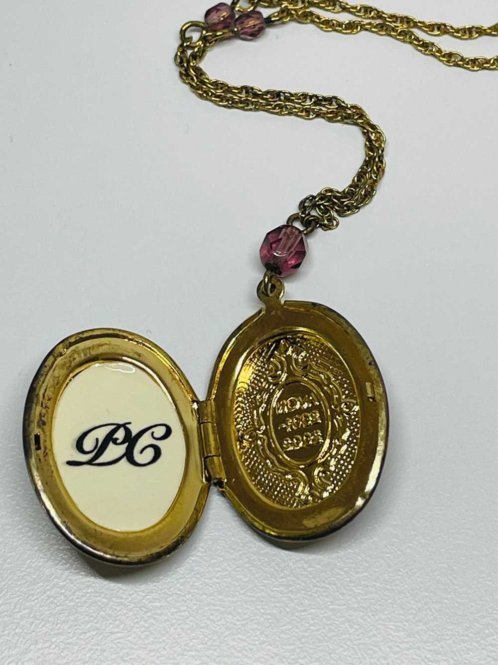 Avon Gold Locket with Purple Rhinestones - image 3