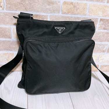 "Fine quality item" PRADA shoulder bag.