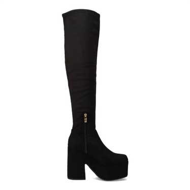 Black suede knee-high boots with platform heels in