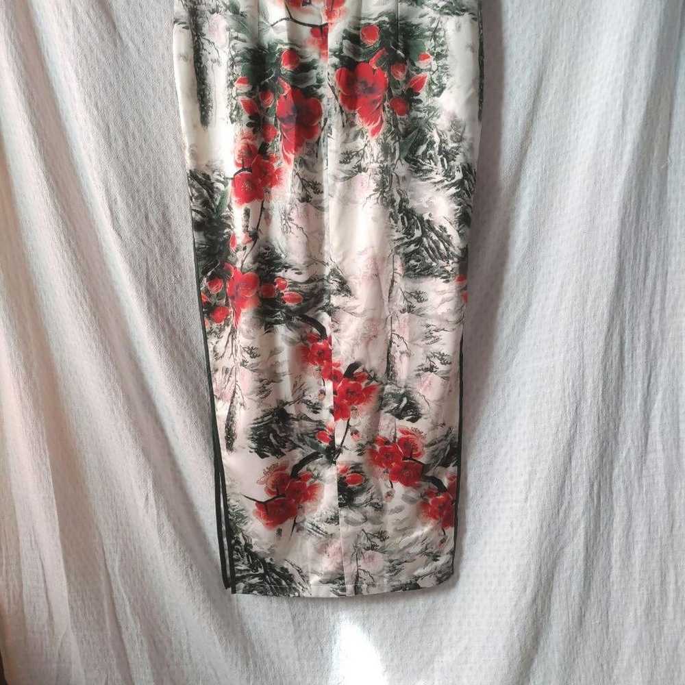 A gorgeous floral-patterned cheongsam. - image 11