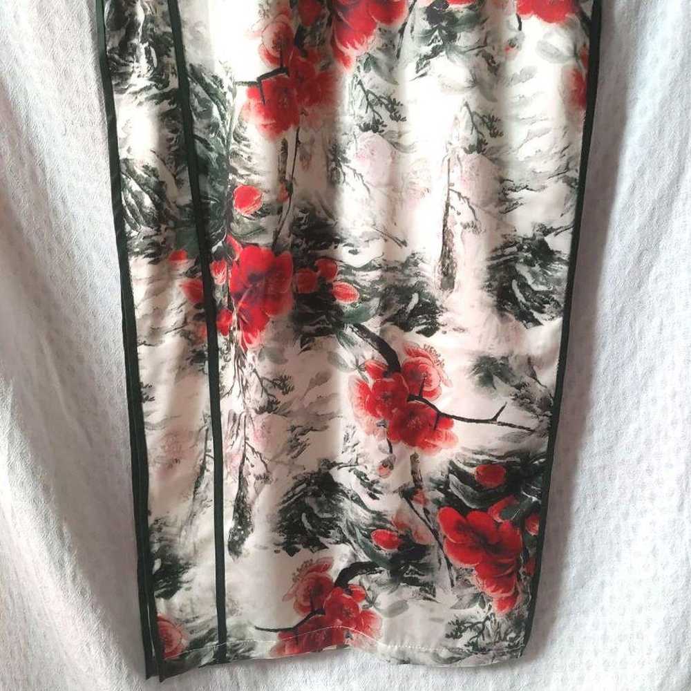 A gorgeous floral-patterned cheongsam. - image 8