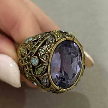 Gold colored large cocktail ring with purple stone - image 1