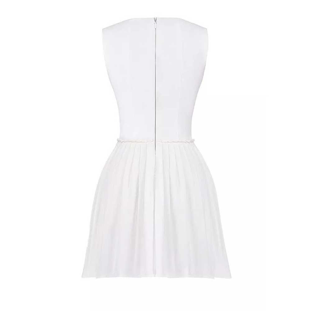 CUPID Small Regular cup
WHITE PLEATED MINI DRESS
… - image 6