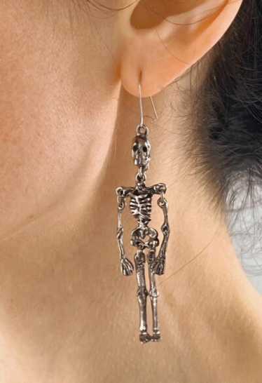 articulated skeleton earrings