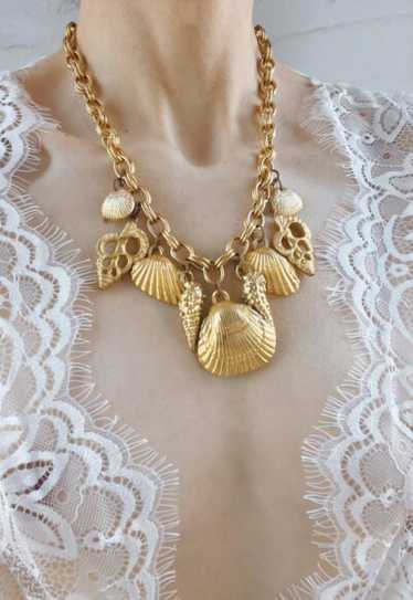 gold tone seashell charm necklace