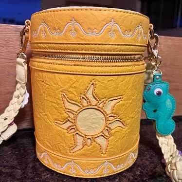 LOUNGEFLY DISNEY cheapest TANGLED PASCAL SUN AOP LIMITED EDITION SLOUCH BACKPACK BAG RARE