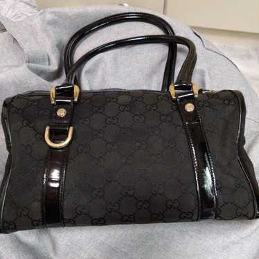 Gucci handbag, black, medium size.