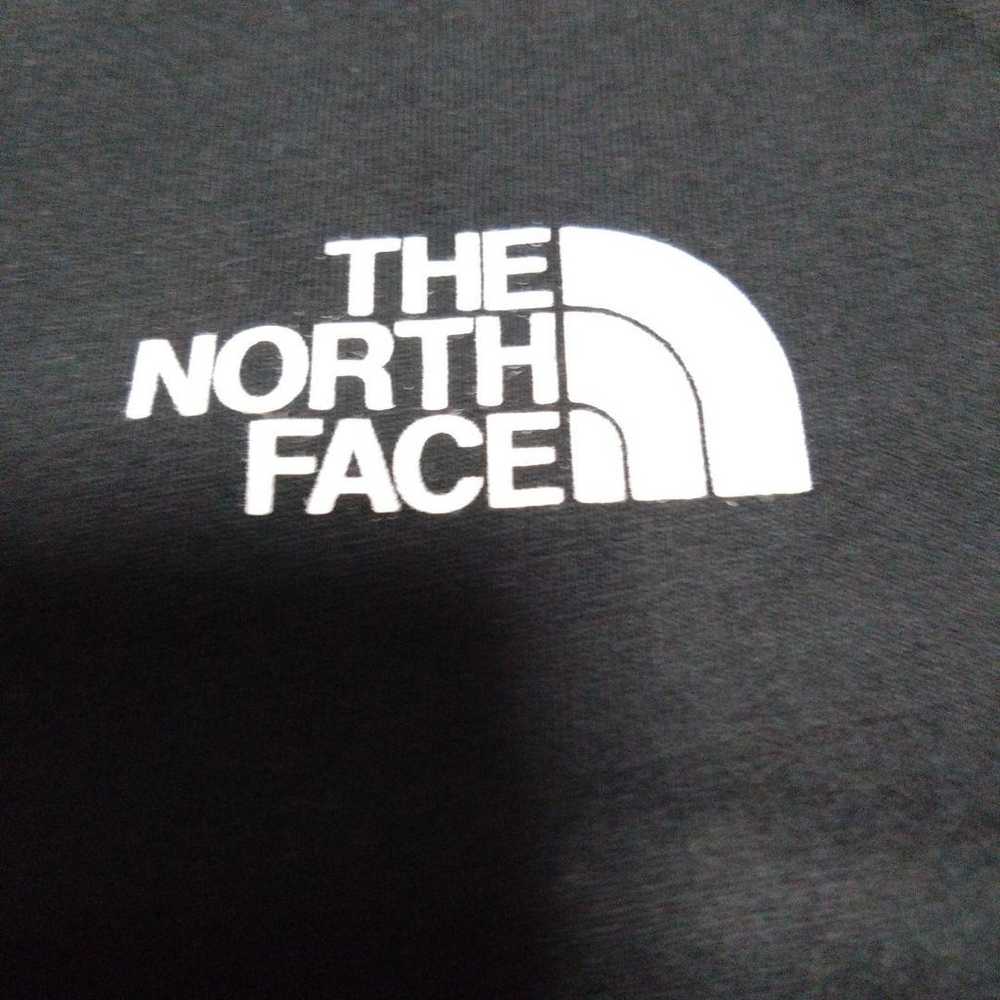 The North Face one-piece outfit. - image 4