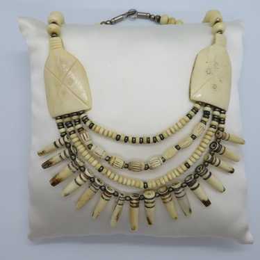 An buy Vintage Buffalo Bone made Skull beads and etched Carnelian Dzi bead necklace for religious Rituals