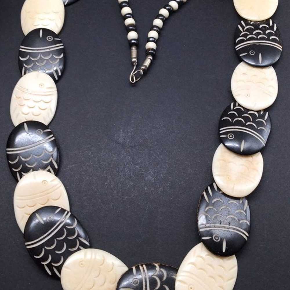 Hand carved bone fish necklace - image 1