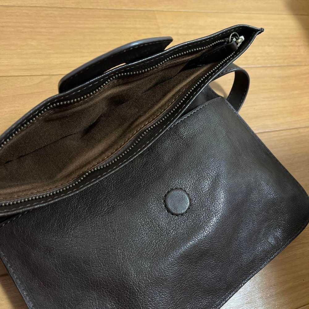 Black leather shoulder bag with studs. - image 3