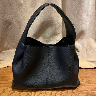 Black leather shoulder bag.