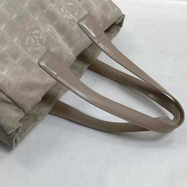 CHANEL Nylon Travel Bag Beige