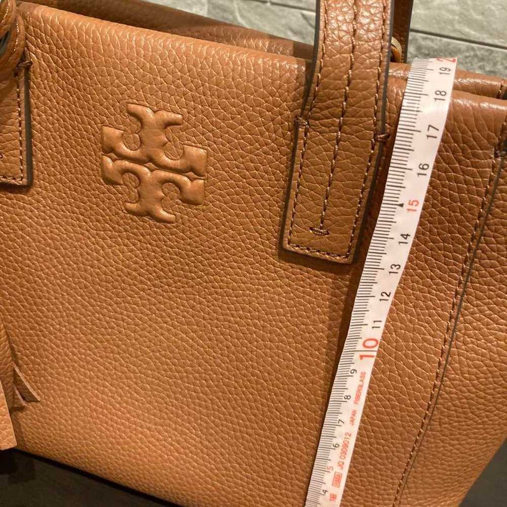 Tory Burch brown leather shoulder bag with tassel - image 12