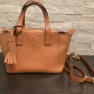 Tory Burch brown leather shoulder bag with tassel - image 1