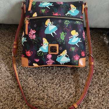 Disney Dooney and Bourke Alice in Wonderland Cross