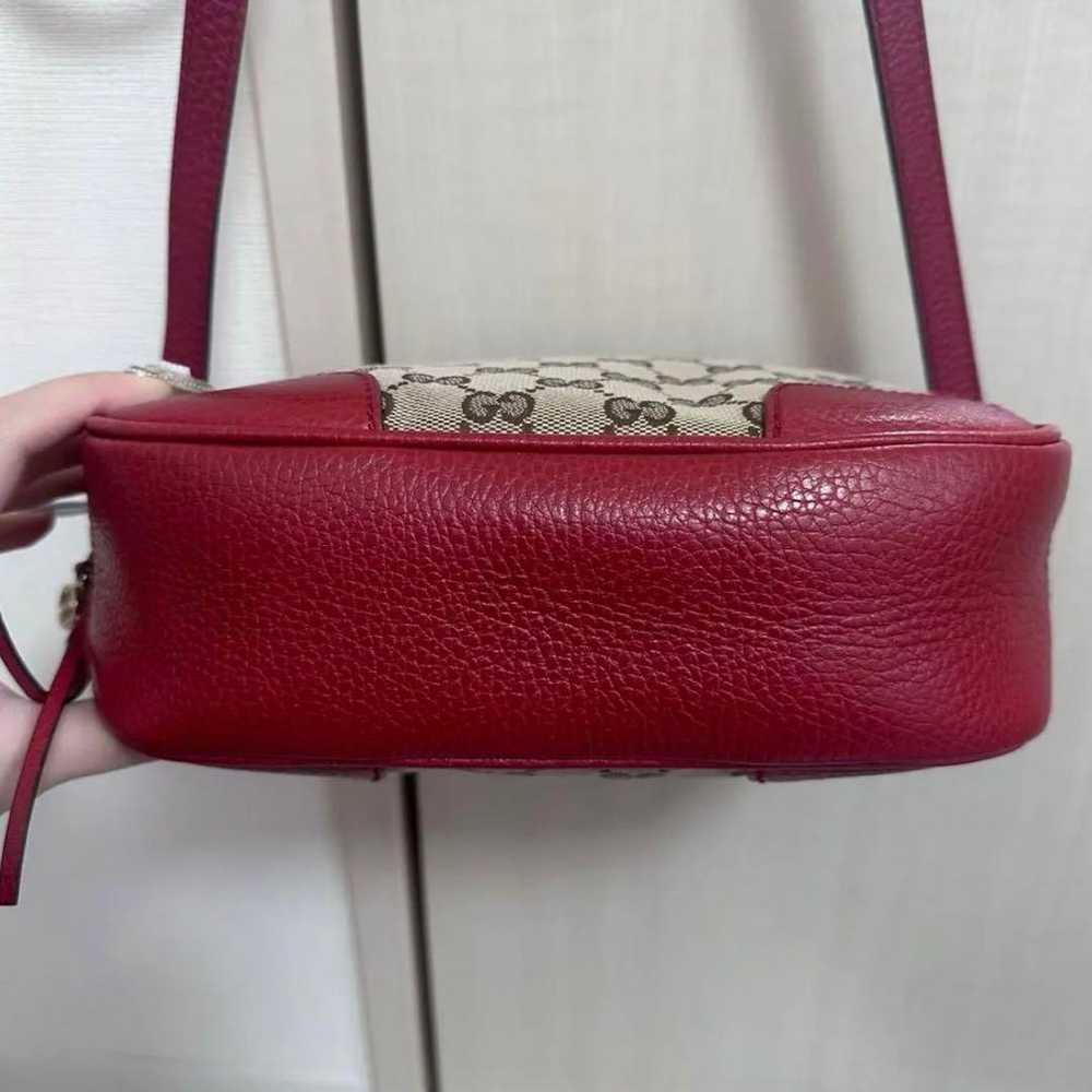 GUCCI shoulder bag with GG pattern in red. - image 4