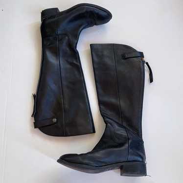 Tall leather black boots