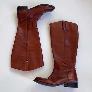 Tall brown leather boots