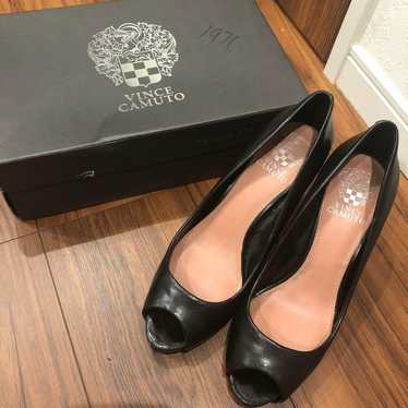 Vince Camuto black open-toe pumps.