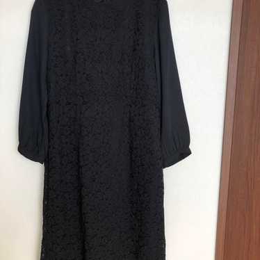 Black lace knee-length dress with long sleeves - image 1