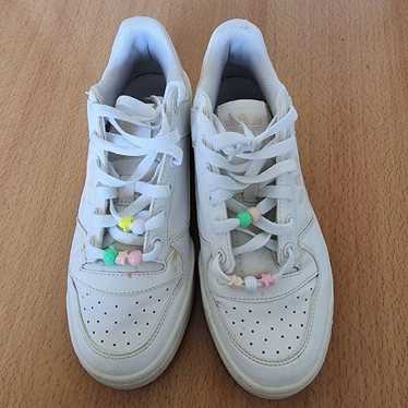 Adidas white sneakers with beads.