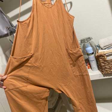 Free people hotshot onesie size small burnt orange