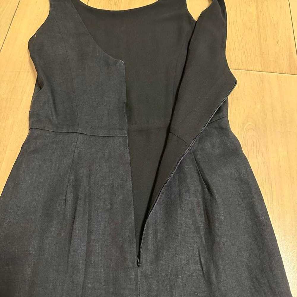 Black sleeveless long dress with a V-neck. - image 3