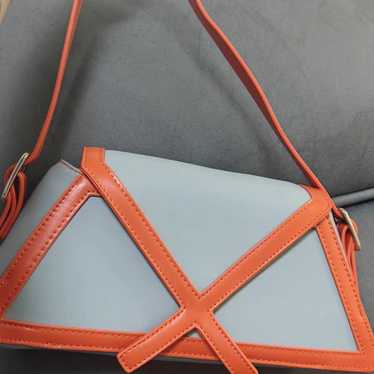 Light blue and orange geometric clutch bag - image 1