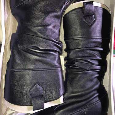 Leather black boots, brand new.