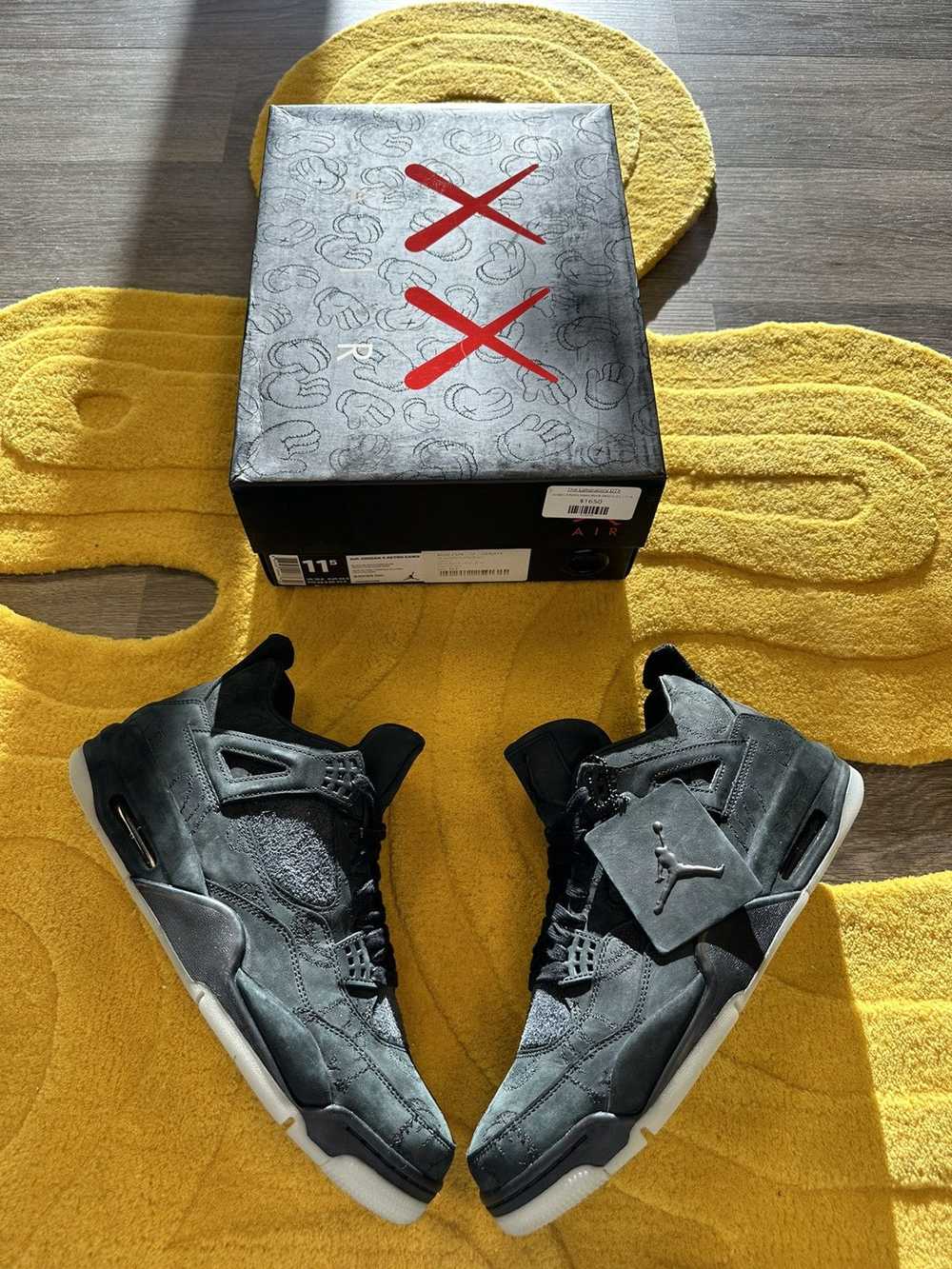 Jordan Brand × Kaws Jordan 4 Retro Kaws Black - image 1