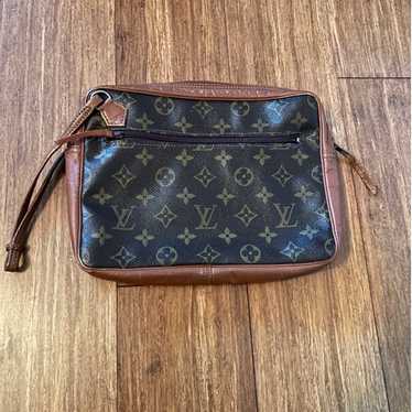 Louis Vuitton Monogram Pochette
Dragonne Wristlet 