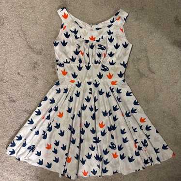 Charming white dress with dinosaur print - image 1