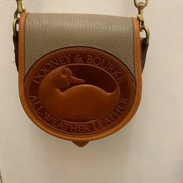 RARE 1980s Dooney & hot bourke leather saddle bag with RiRi zipper