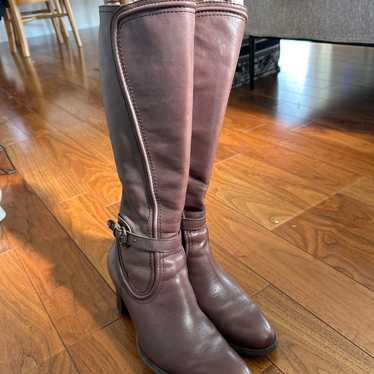 Brown leather long boots with belt.