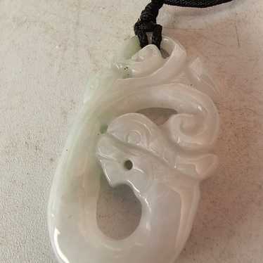 Vintage carved white jade pendant on a black  cord - image 1